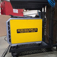 Load image into Gallery viewer, Hero-branded wire feeder installed above the Darkstar 1800 power supply