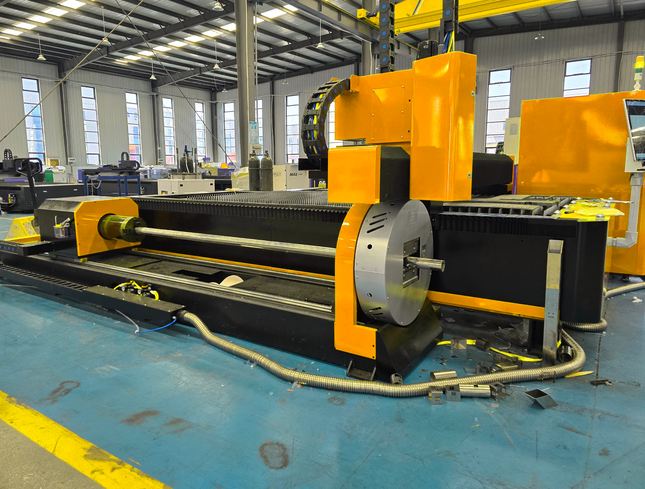 Industrial CNC fiber laser cutter for sheet and tube metal fabrication